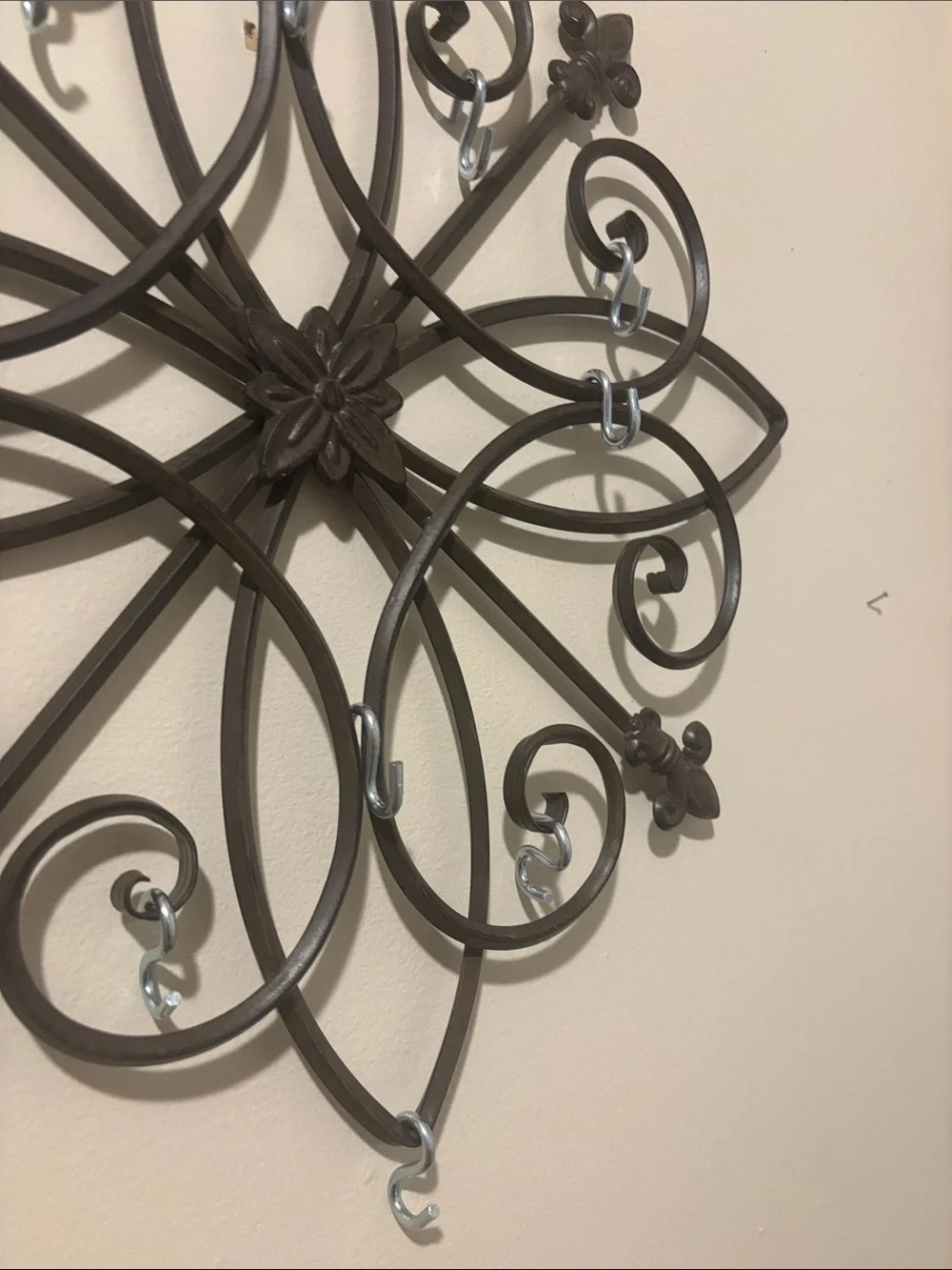 Decorative metal wall hanging jewelry holder